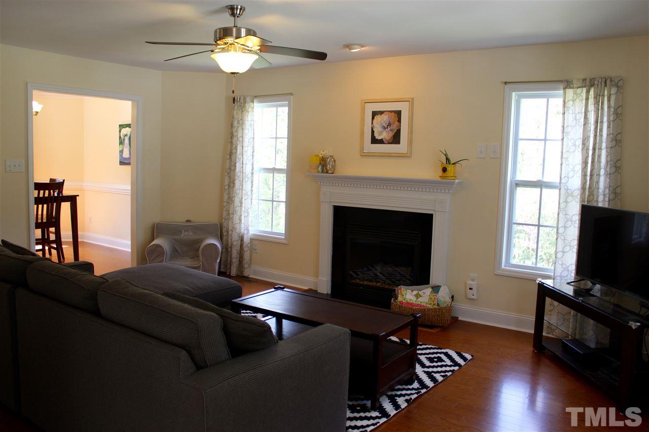 409 West Cornwallis Road Durham, NC 27707 - Photo 4 of 25 brand new gleaming hardwoods in family room and dining room