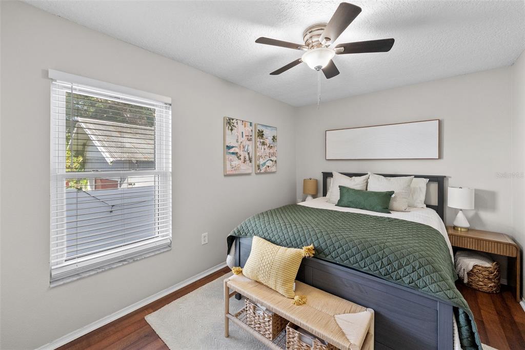 3323 West Pine Street Tampa, FL 33607 - Photo 19 of 32 a bedroom with a bed and a window