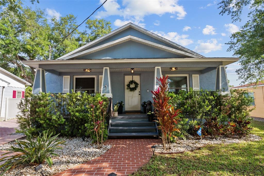 3323 West Pine Street Tampa, FL 33607 - Photo 27 of 32 a front view of a house with garden