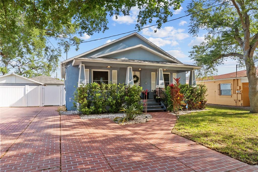 3323 West Pine Street Tampa, FL 33607 - Photo 32 of 32 a front view of house with yard and trees around