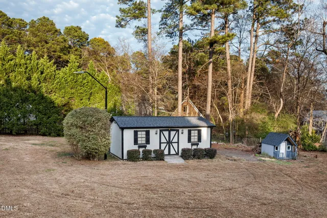 a view of outdoor space with deck and yard