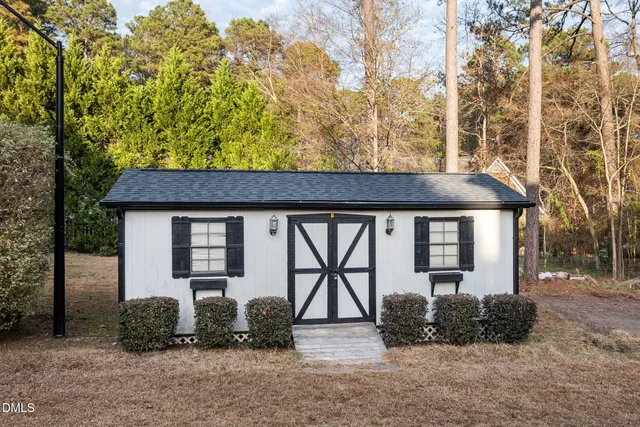 a backyard of a house with lots of green space