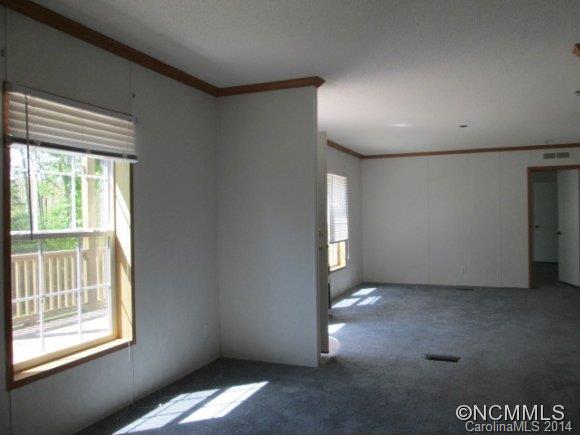 141 Prairie Cottage Road Clyde, NC 28721 - Photo 3 of 20 an empty room with windows