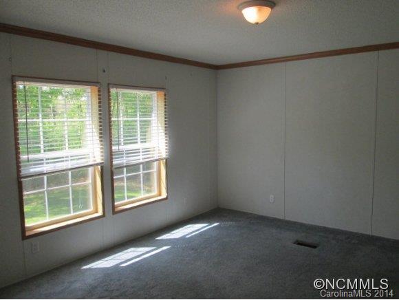 141 Prairie Cottage Road Clyde, NC 28721 - Photo 5 of 20 a view of empty room with window