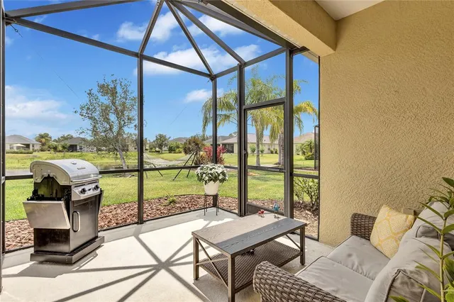 a living room with large windows