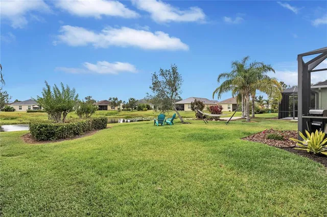 a view of a garden with houses