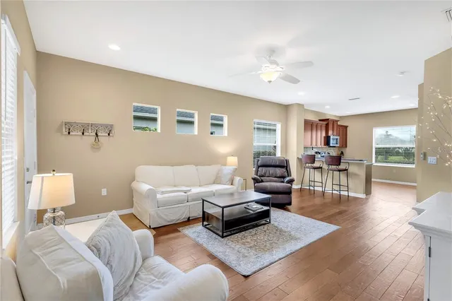 a living room with furniture and a table