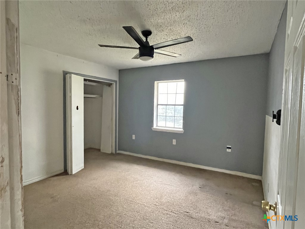 104 East Elms Road Killeen, TX 76542 - Photo 13 of 24 a view of an empty room with a window