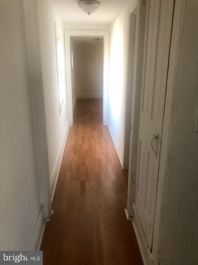 60 Walnut Street Salem, NJ 08079 - Photo 2 of 11 a view of a hallway with wooden floor