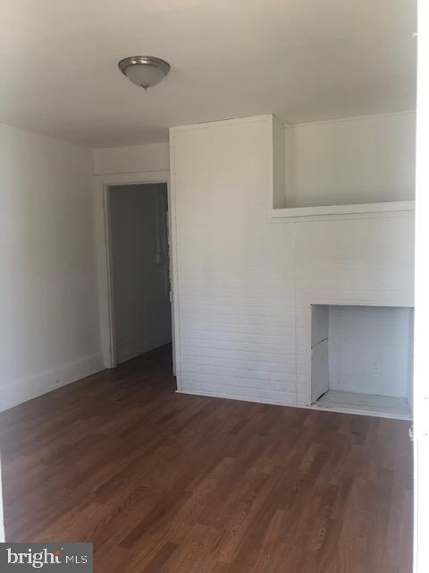 60 Walnut Street Salem, NJ 08079 - Photo 11 of 11 a view of an empty room with wooden floor and closet