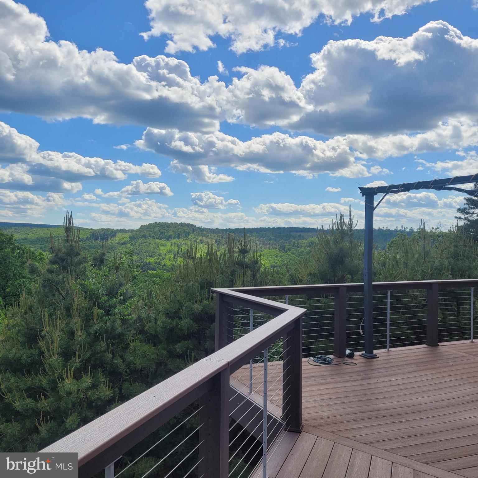 729 High Mountain Road Gardners, PA 17324 - Photo 4 of 15 a view of roof deck with wooden floor and fence