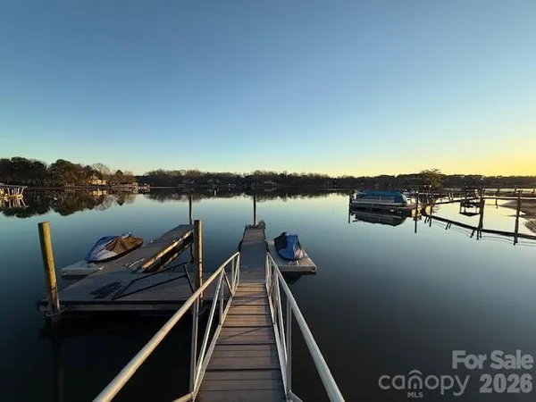 a view of a lake with sitting area