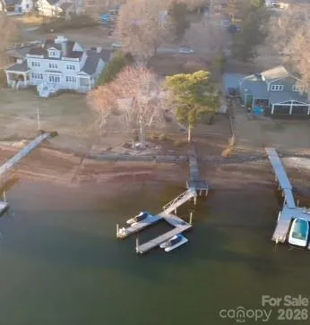 a view of a lake in a back yard