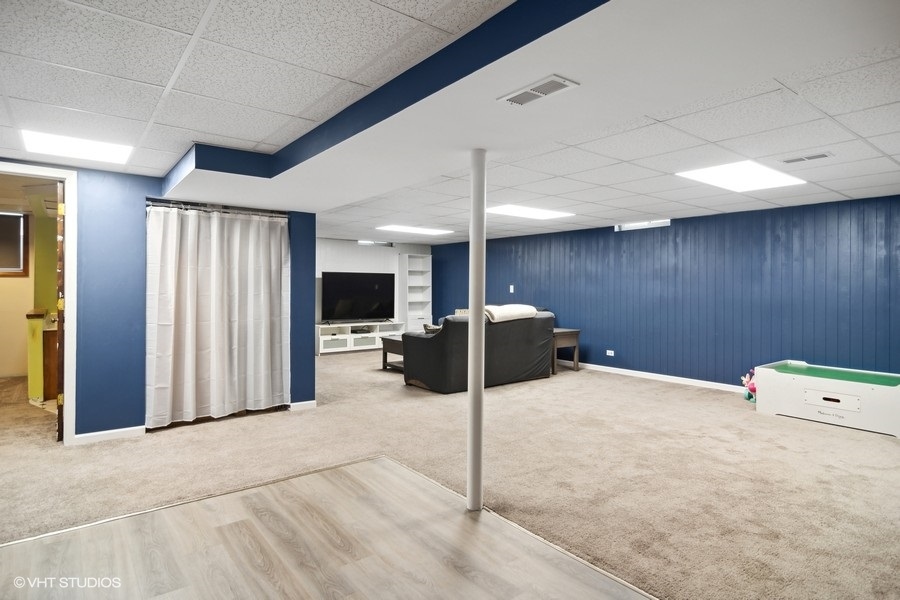 2110 Savannah Road Elgin, IL 60123 - Photo 14 of 17 a projector room with a bed and a television