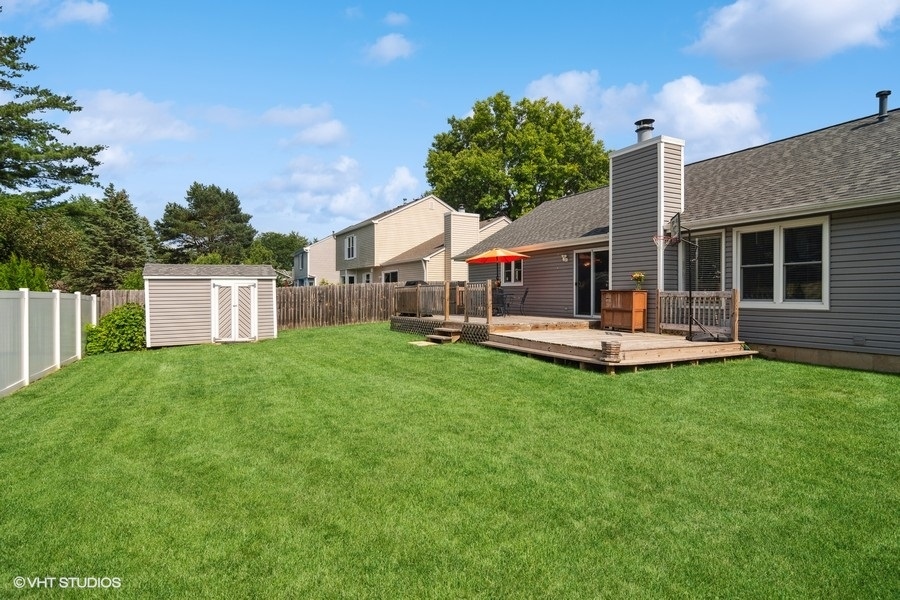 2110 Savannah Road Elgin, IL 60123 - Photo 16 of 17 a swimming pool with outdoor seating and yard
