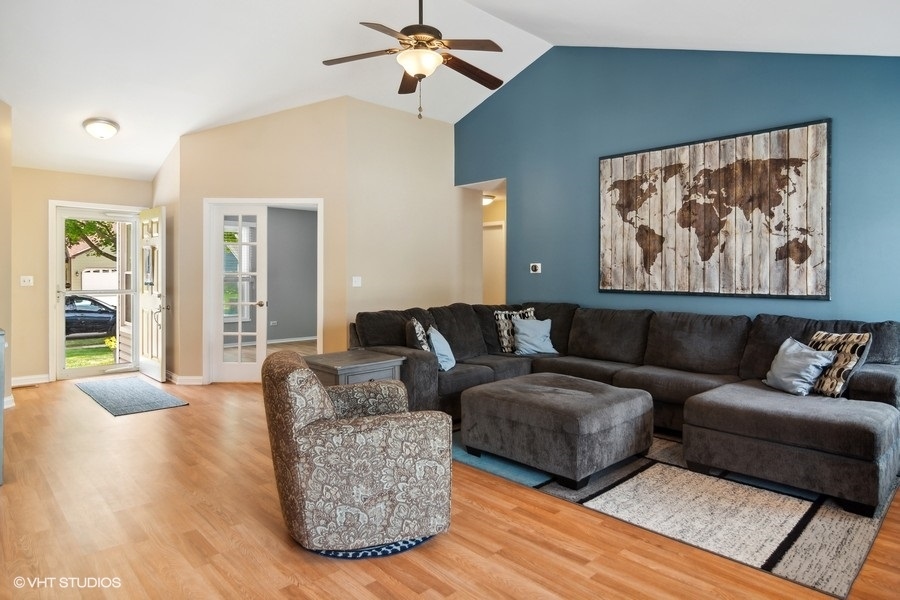 2110 Savannah Road Elgin, IL 60123 - Photo 4 of 17 a living room with furniture and a large window