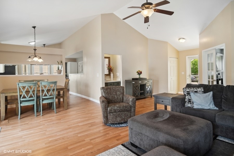 2110 Savannah Road Elgin, IL 60123 - Photo 5 of 17 a living room with furniture and wooden floor