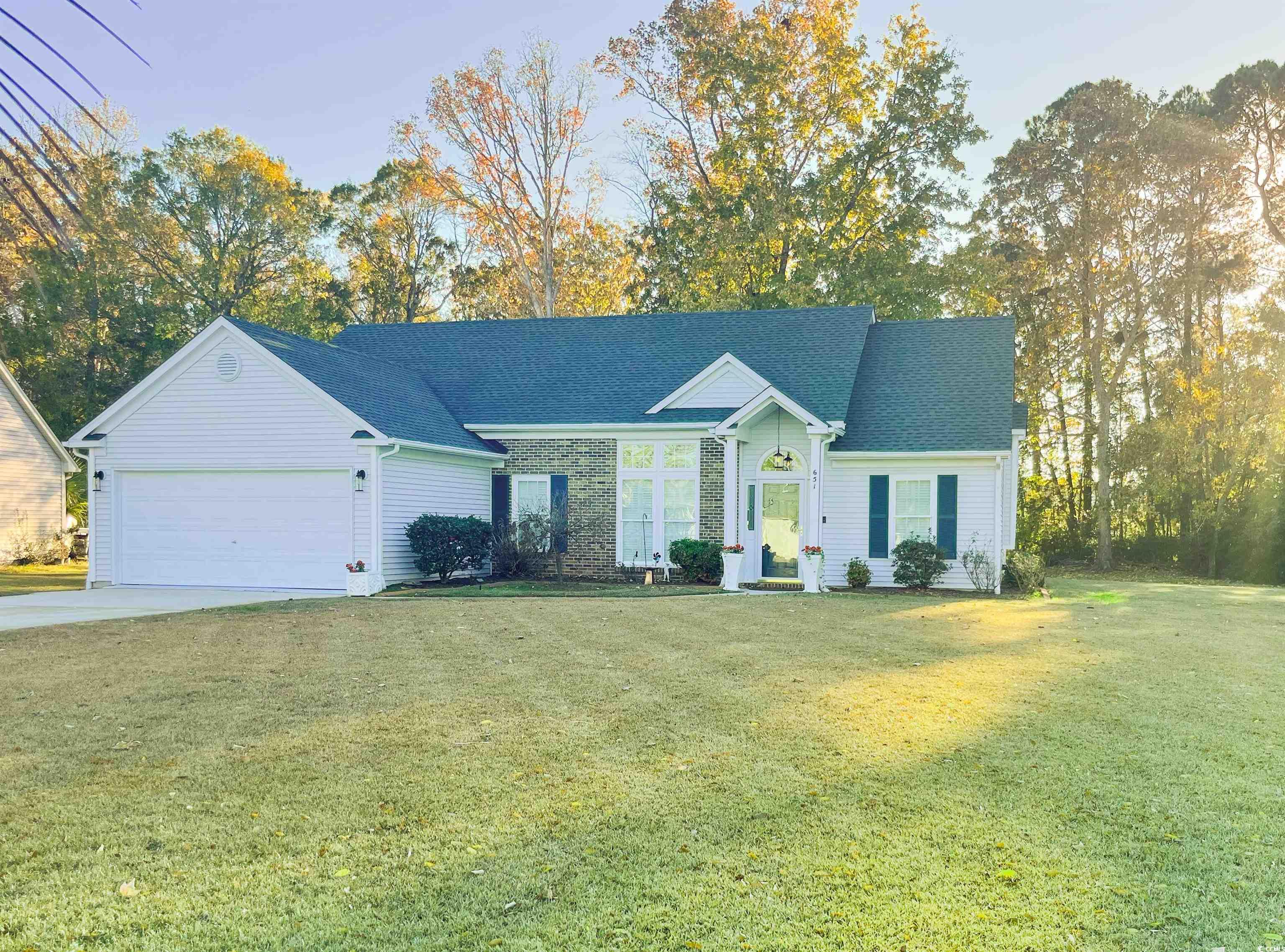 651 Bluebird Lane Murrells Inlet, SC 29576 - Photo 1 of 34 Ranch-style house featuring a garage and a front l