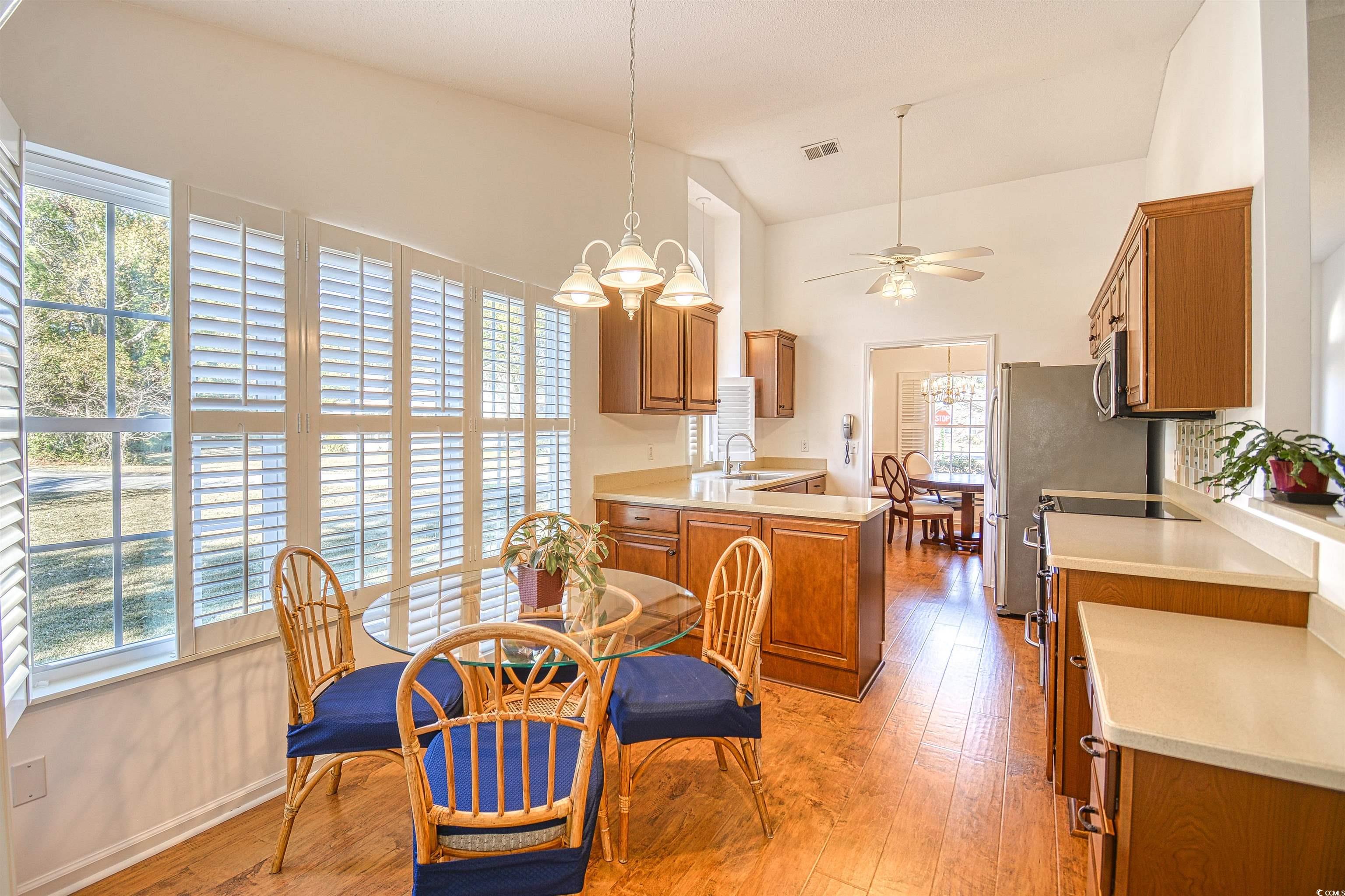 651 Bluebird Lane Murrells Inlet, SC 29576 - Photo 6 of 34 Eat-in Kitchen featuring a healthy amount of sunli