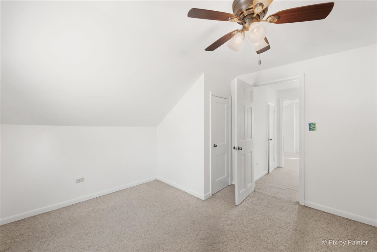 1106 West Highland Avenue Elgin, IL 60123 - Photo 16 of 47 a view of a room with a fan