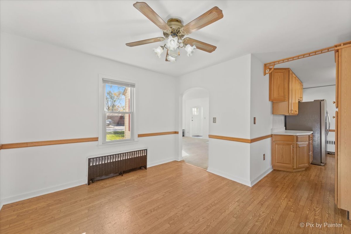1106 West Highland Avenue Elgin, IL 60123 - Photo 17 of 47 a view of kitchen with sink and wooden floor