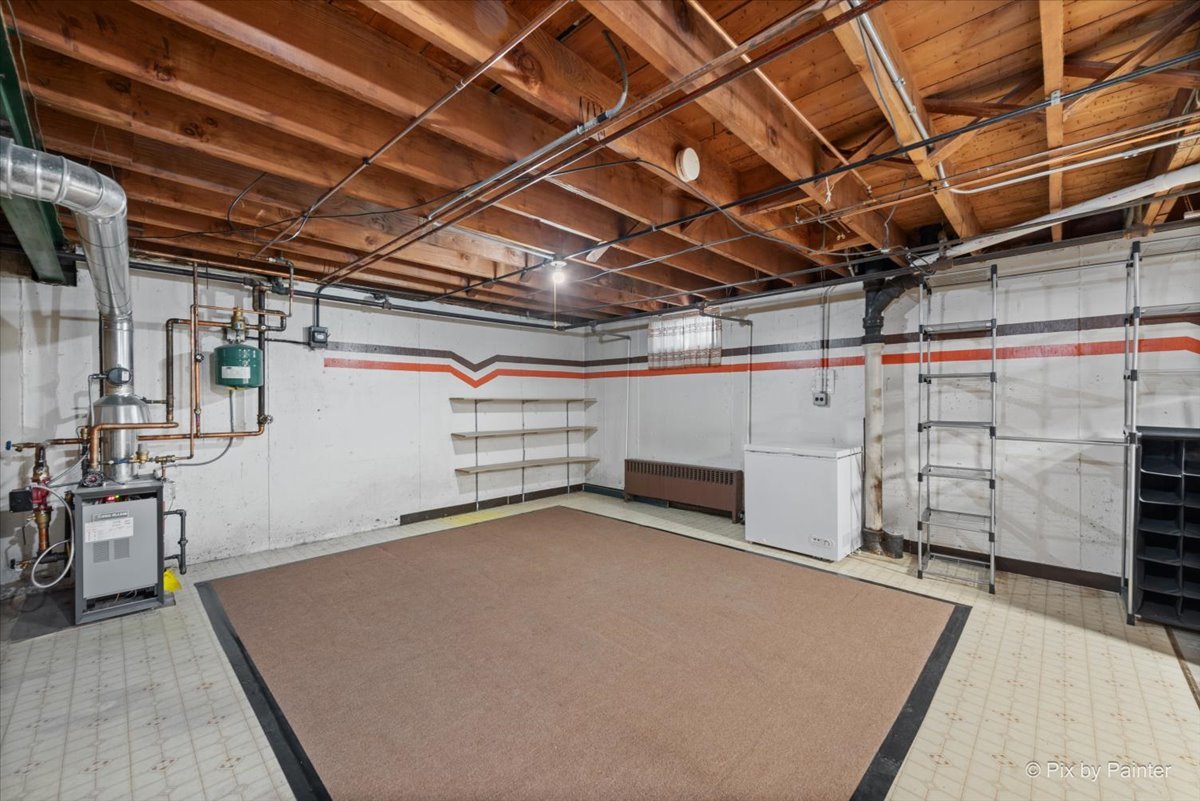 1106 West Highland Avenue Elgin, IL 60123 - Photo 22 of 47 a view of a room with storage