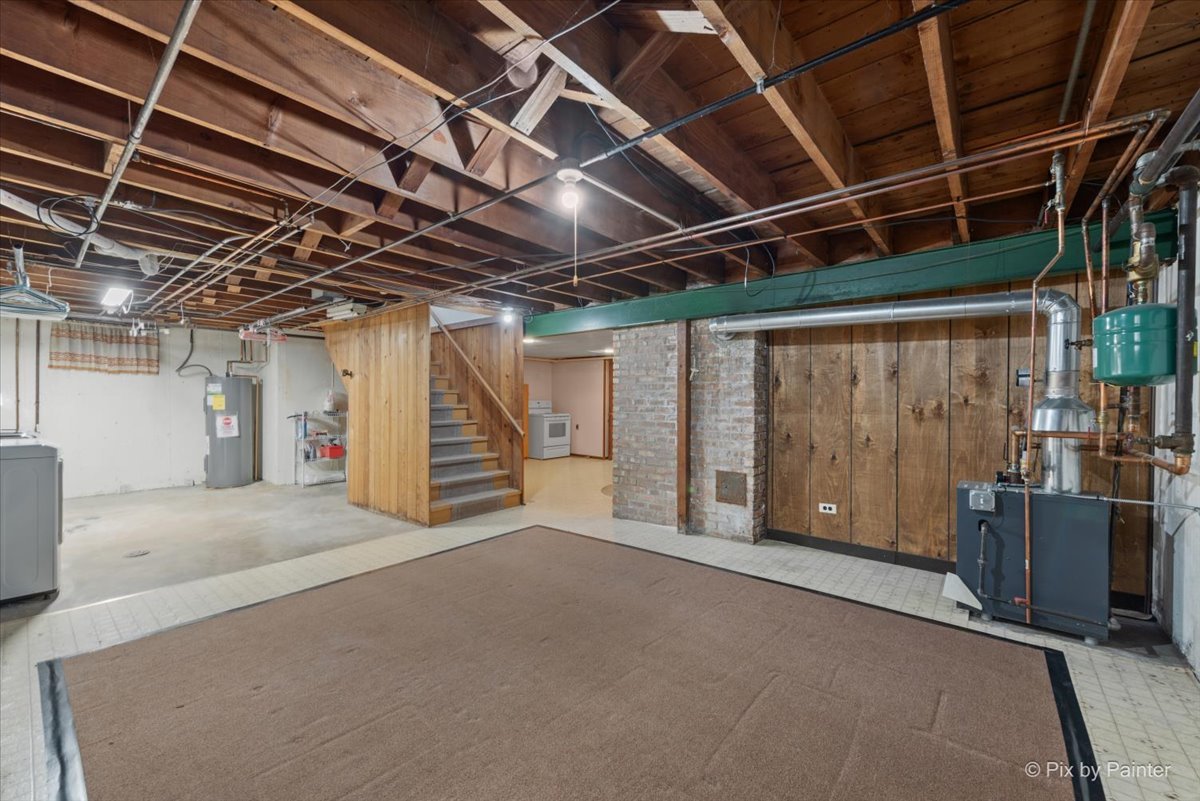 1106 West Highland Avenue Elgin, IL 60123 - Photo 34 of 47 a view of an empty room with wooden walls