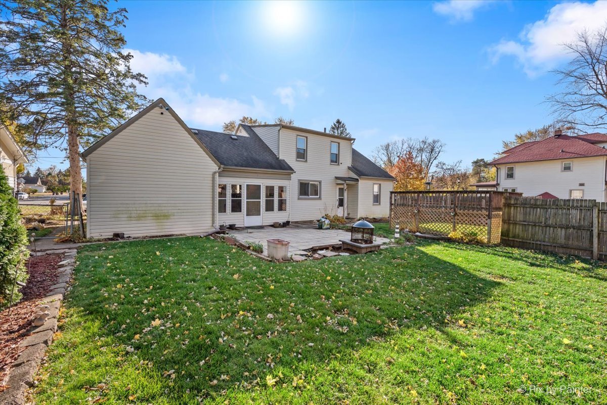 1106 West Highland Avenue Elgin, IL 60123 - Photo 39 of 47 a view of a house with backyard and sitting area