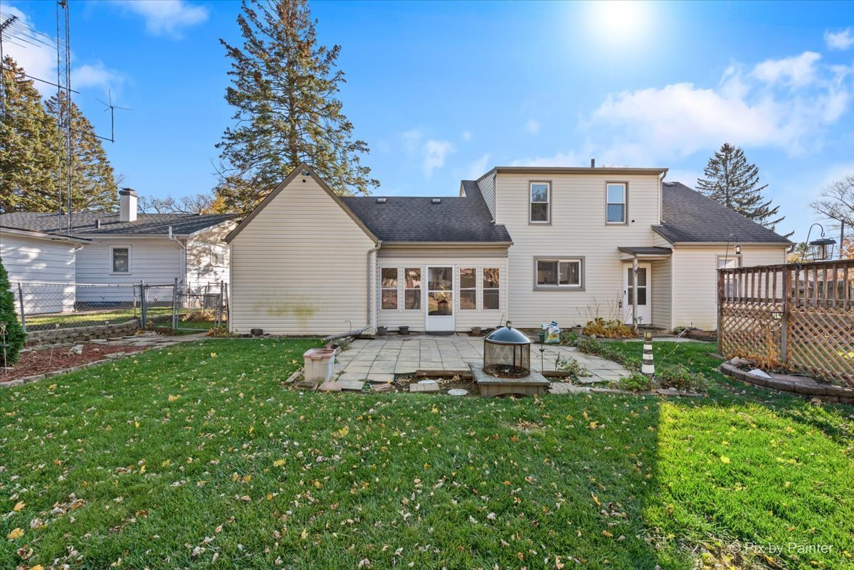1106 West Highland Avenue Elgin, IL 60123 - Photo 40 of 47 a front view of house with yard and outdoor seating