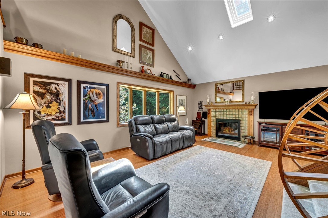 1057 Congress Lake Road Mogadore, OH 44260 - Photo 6 of 50 Soaring ceilings and a cozy fireplace