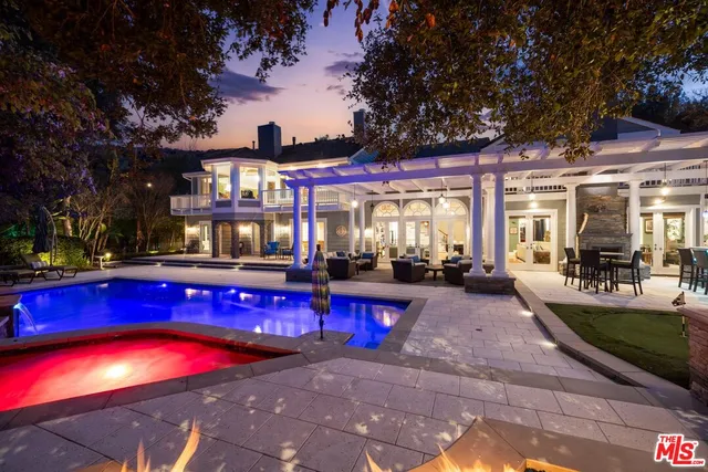 a outdoor living space with patio furniture and a potted plants