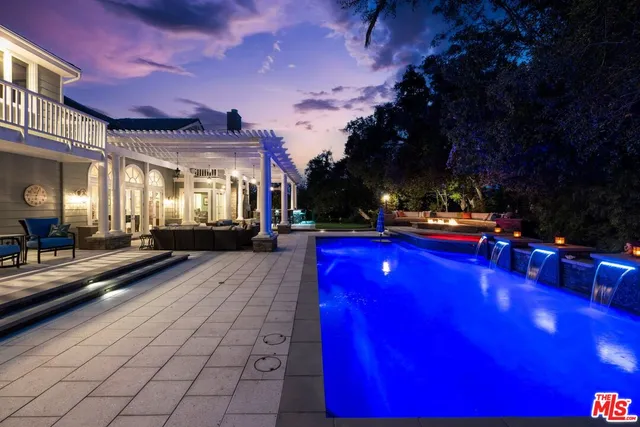 a view of an outdoor dining space with a patio