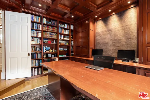 a view of a balcony with wooden floor