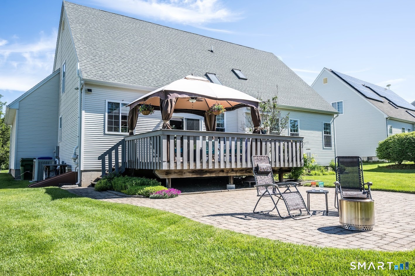 72 Annello Way Middletown, CT 06457 - Photo 21 of 27 The deck invites you out. The patio makes you stay.