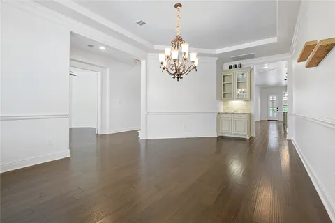 a view of a livingroom with wooden floor