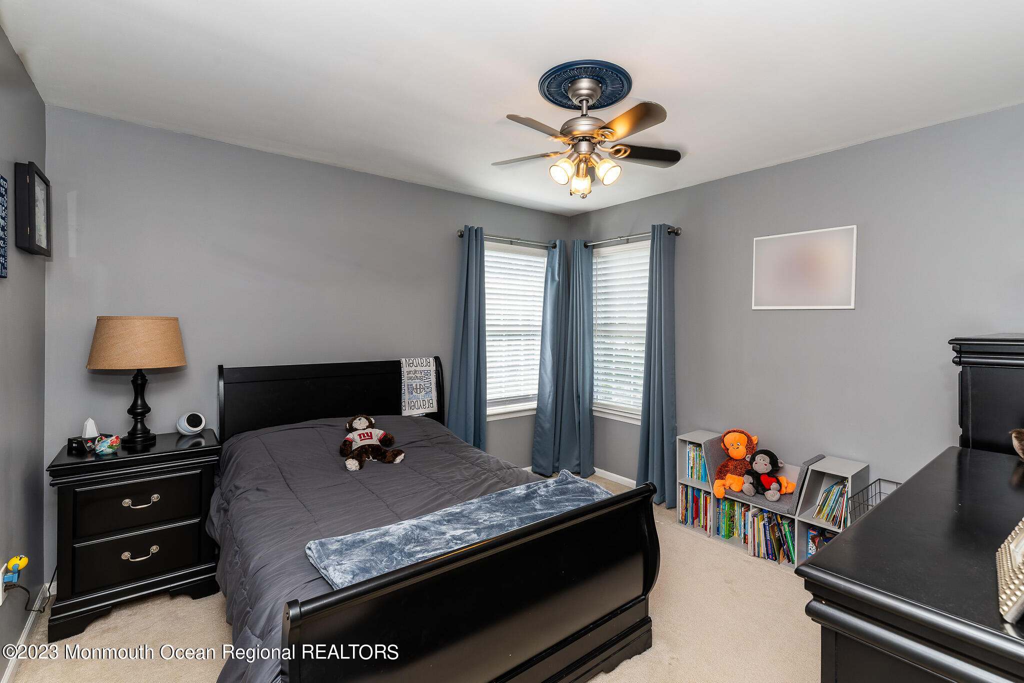 1 Overlook Place Bayville, NJ 08721 - Photo 34 of 66 a bedroom with a bed and a chandelier