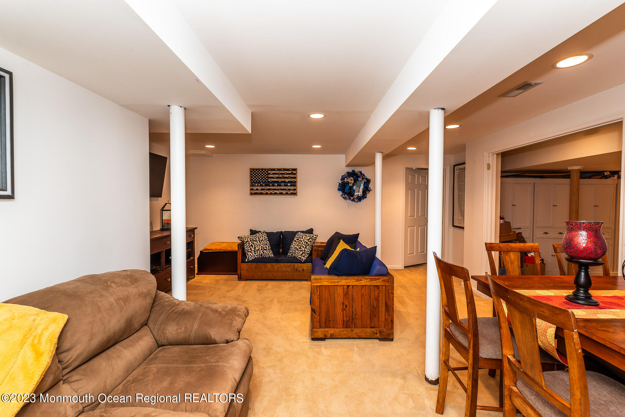 1 Overlook Place Bayville, NJ 08721 - Photo 39 of 66 a living room with furniture and a potted plant
