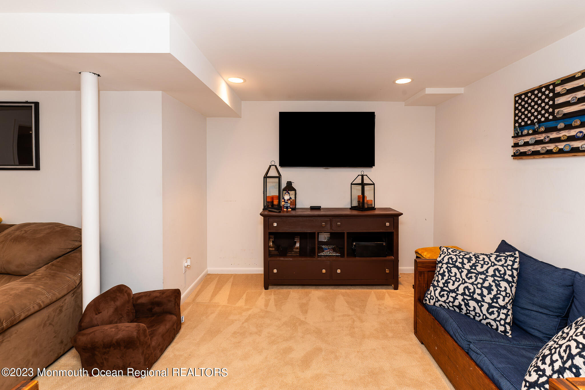 1 Overlook Place Bayville, NJ 08721 - Photo 41 of 66 a living room with furniture and a flat screen tv