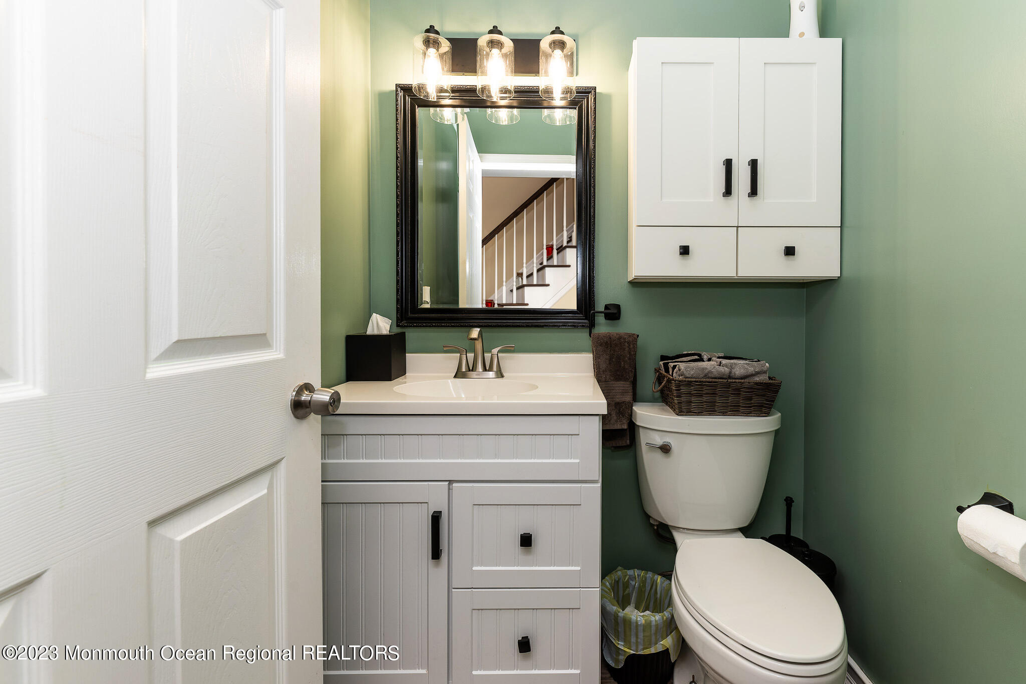 1 Overlook Place Bayville, NJ 08721 - Photo 5 of 66 a bathroom with a toilet sink and mirror