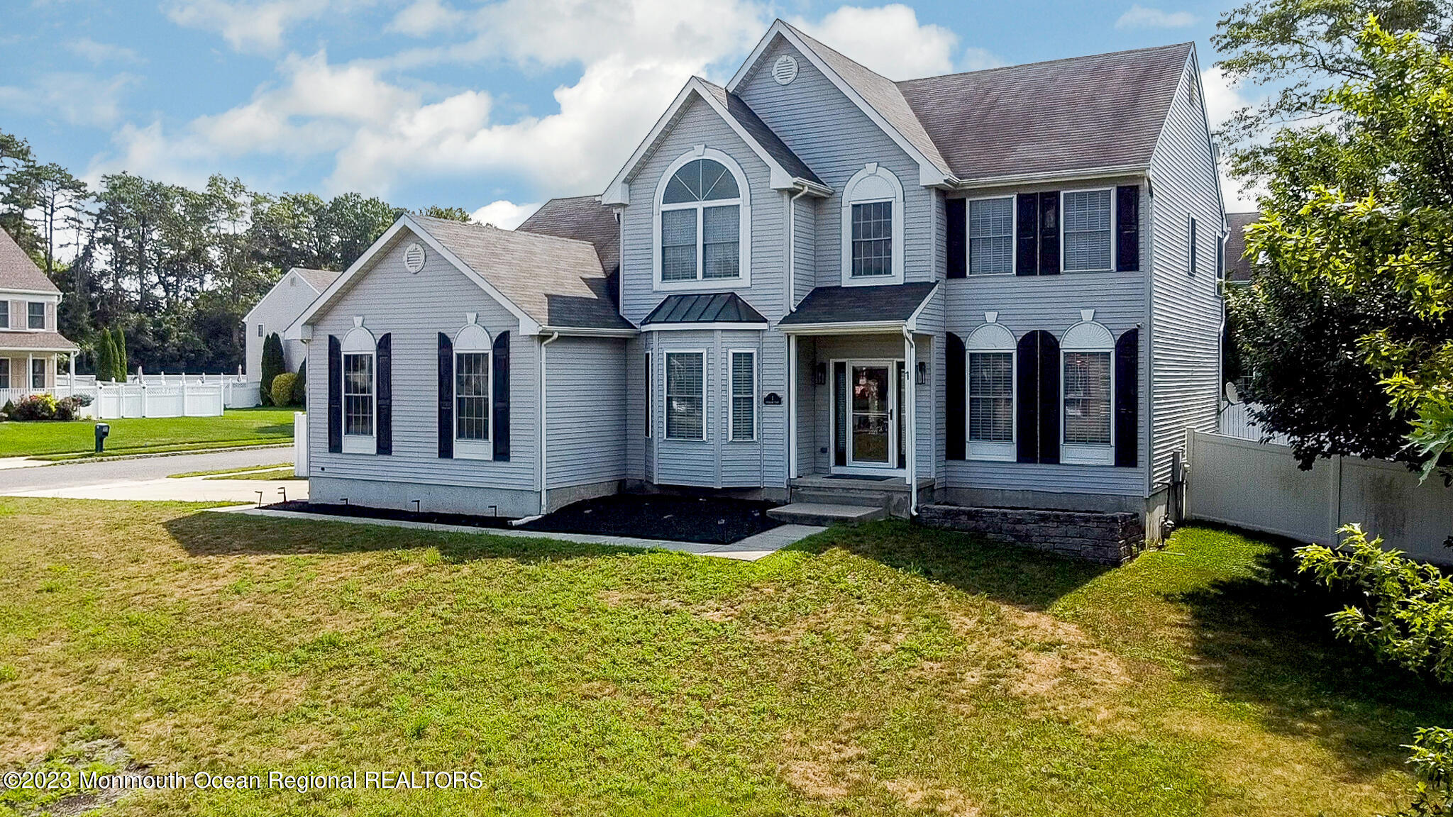 1 Overlook Place Bayville, NJ 08721 - Photo 58 of 66 a front view of a house with a yard