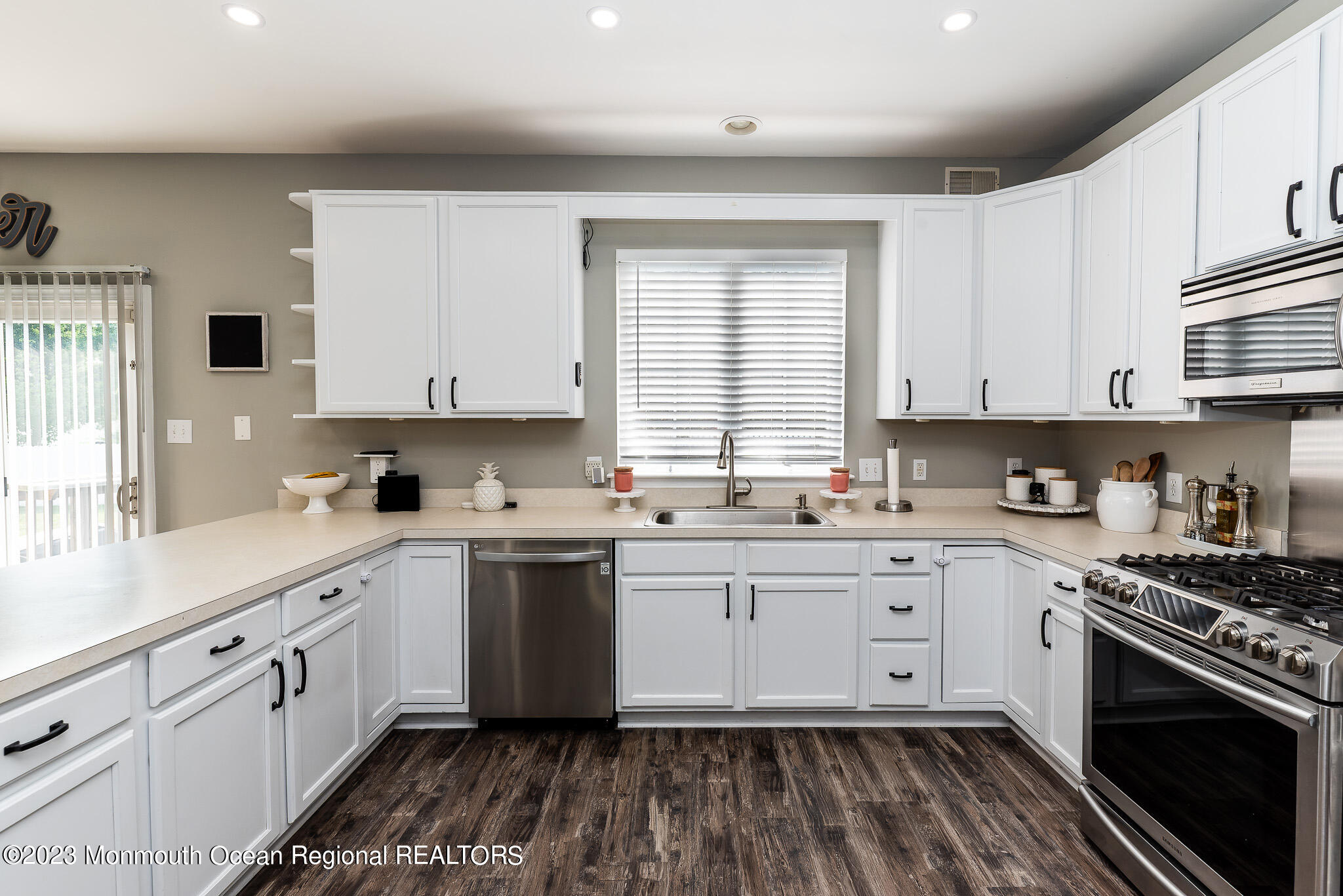 1 Overlook Place Bayville, NJ 08721 - Photo 9 of 66 a kitchen with cabinets stainless steel appliances a sink and a window