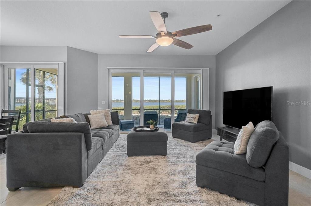 1258 Riverscape Street, Unit A Bradenton, FL 34208 - Photo 19 of 63 a living room with furniture and a flat screen tv