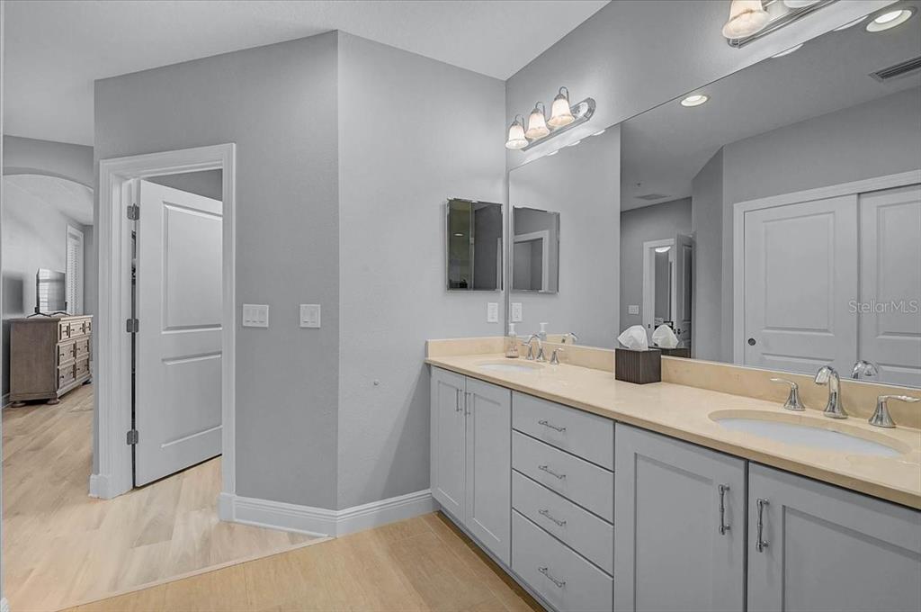 1258 Riverscape Street, Unit A Bradenton, FL 34208 - Photo 25 of 63 a bathroom with double sink and a mirror