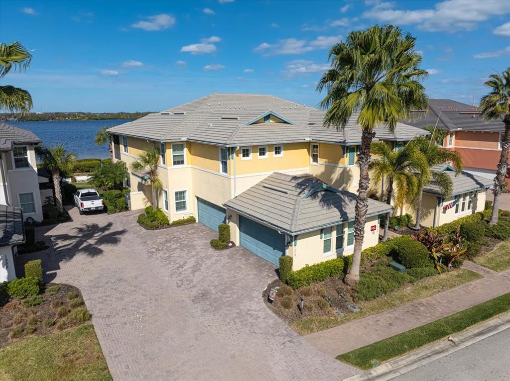 1258 Riverscape Street, Unit A Bradenton, FL 34208 - Photo 3 of 63 a view of a house with backyard and sitting area