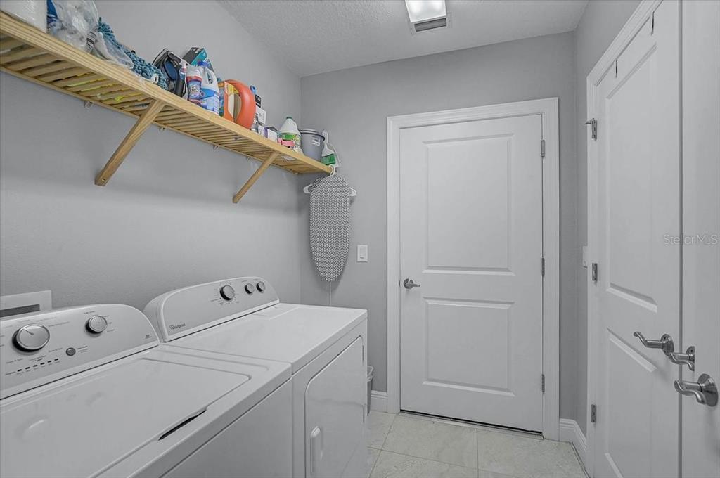 1258 Riverscape Street, Unit A Bradenton, FL 34208 - Photo 32 of 63 a utility room with dryer and washer