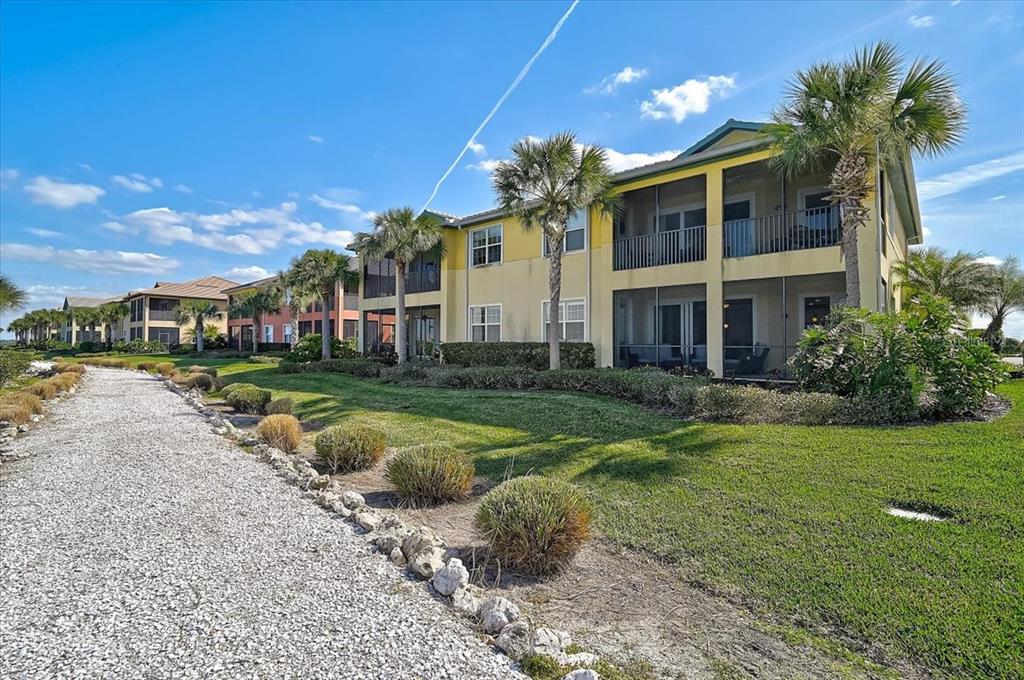 1258 Riverscape Street, Unit A Bradenton, FL 34208 - Photo 36 of 63 a view of a house with a swimming pool