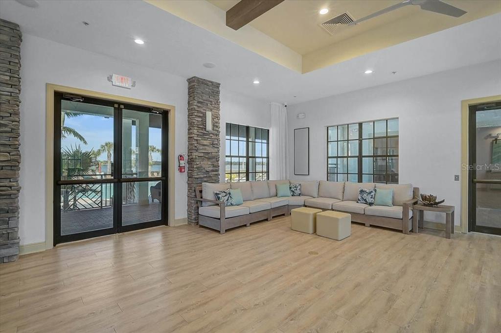 1258 Riverscape Street, Unit A Bradenton, FL 34208 - Photo 43 of 63 a living room with furniture and a large window