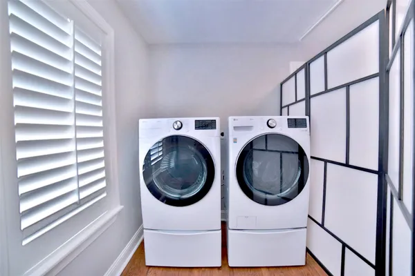 a kitchen with a washer and dryer