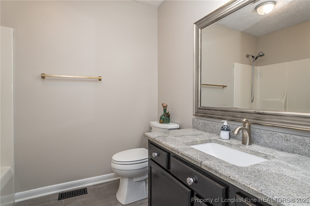 5411 Archer Road Hope Mills, NC 28348 - Photo 15 of 29 Hall Bathroom