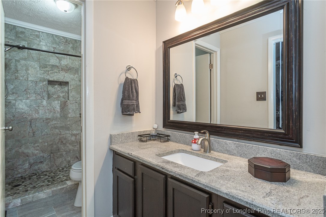 5411 Archer Road Hope Mills, NC 28348 - Photo 20 of 29 Primary bathroom